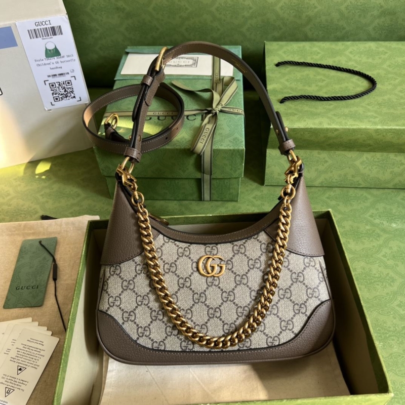 G*u*i top handle bags